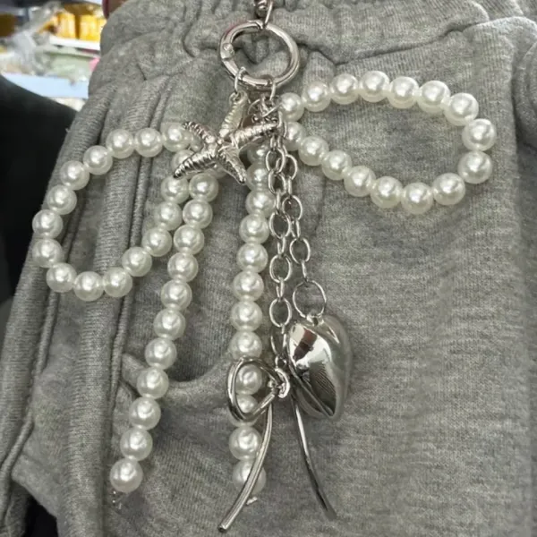 Other*Boogzel Clothing Pearl Bow Charm Keychain Silver