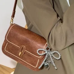 Other*Boogzel Clothing Pearl Bow Charm Keychain Silver